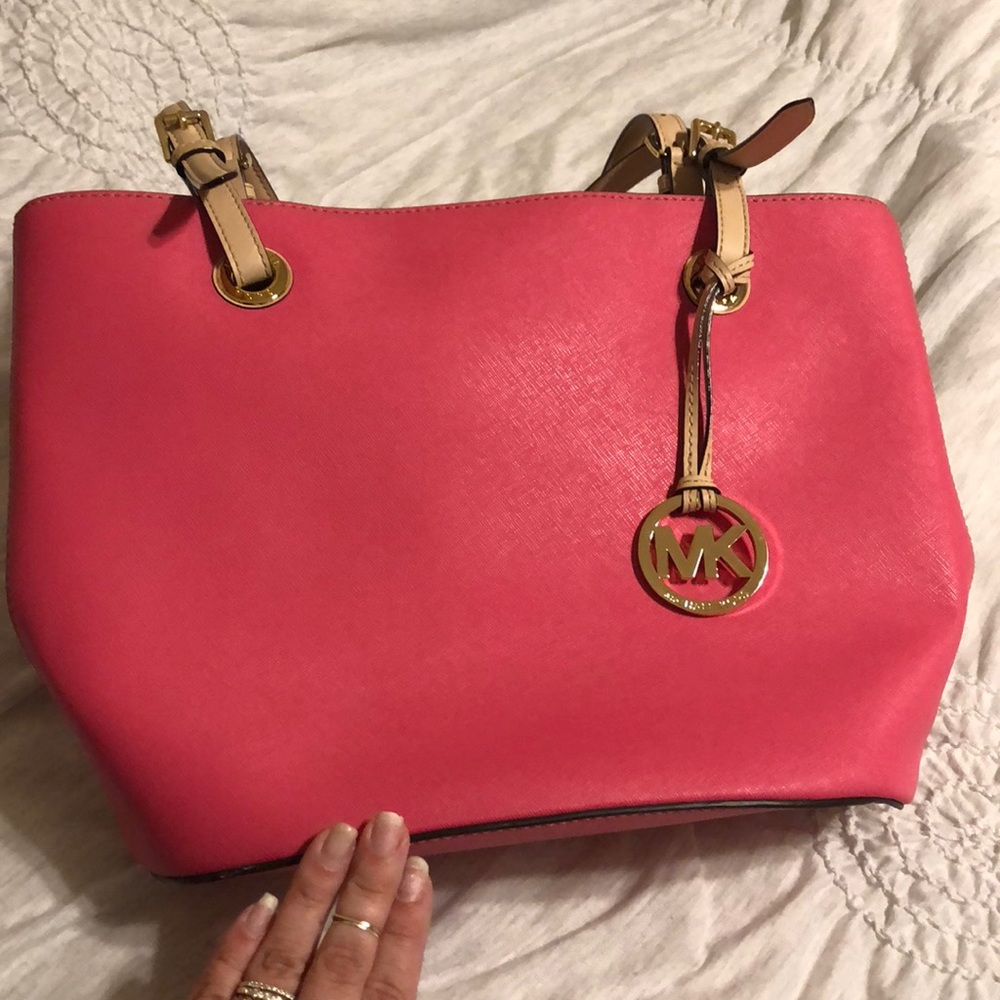 MK purse. Hot pink. Tan straps. Gold accent